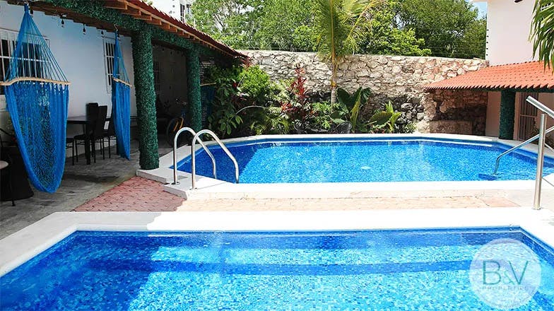 villa-minerva-for-rent-long-term-bv-properties-cozumel-pool-garden